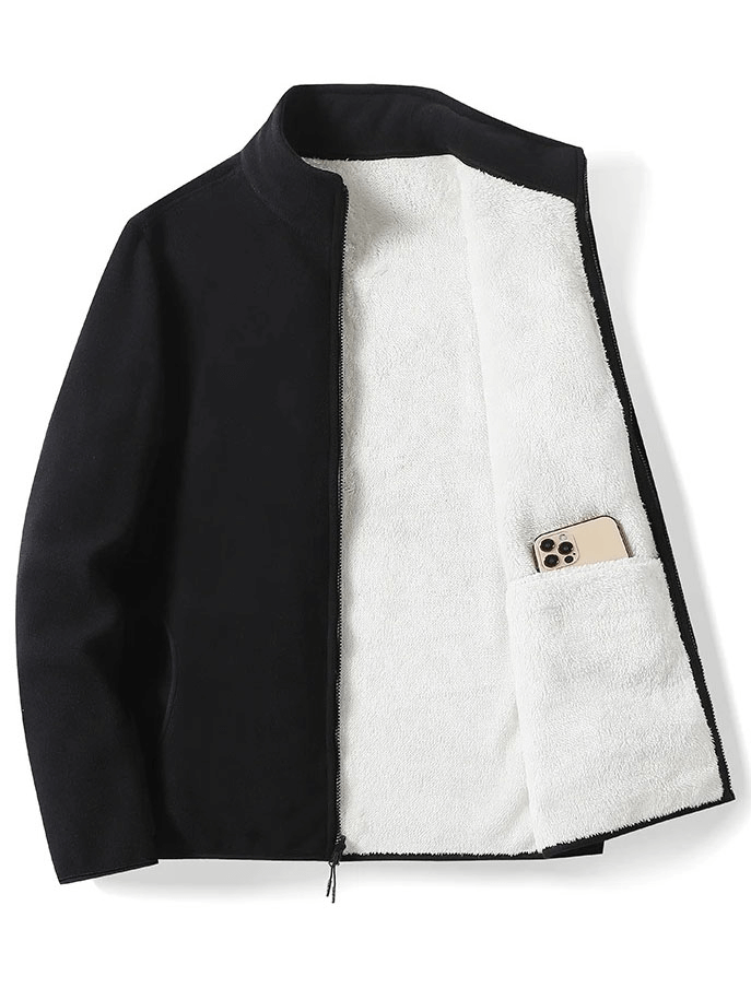 Women's black fleece jacket with white lining and inner pocket holding a smartphone, perfect for stylish winter wear.